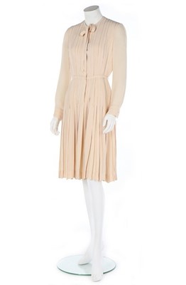 Lot 255 - A Chanel haute couture ivory silk crêpe dress,...