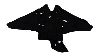 Lot 258 - An important early Comme des Garçons black knitted wool ensemble, 'Holes' collection, Autumn-Winter 1982-83