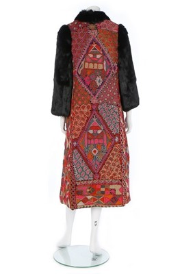 Lot 258 - A Thea Porter Iraqi Samawa-carpet coat, 1970,...