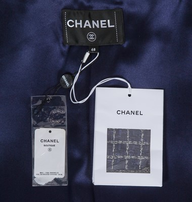 Lot 7 - A Chanel by Karl Lagerfeld navy tweed coat, 'Paris Cosmopolite' collection, Metiers d'Art, Pre-Fall 2017
