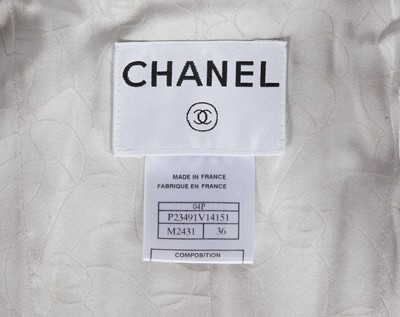 Lot 67 - A Chanel by Karl Lagerfeld tweed suit, Spring-Summer 2004