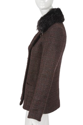 Lot 46 - A Chanel by Karl Lagerfeld brown and black tweed and fur jacket, circa 2010