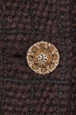 Lot 46 - A Chanel by Karl Lagerfeld brown and black tweed and fur jacket, circa 2010