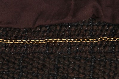 Lot 46 - A Chanel by Karl Lagerfeld brown and black tweed and fur jacket, circa 2010