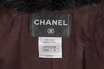 Lot 46 - A Chanel by Karl Lagerfeld brown and black tweed and fur jacket, circa 2010