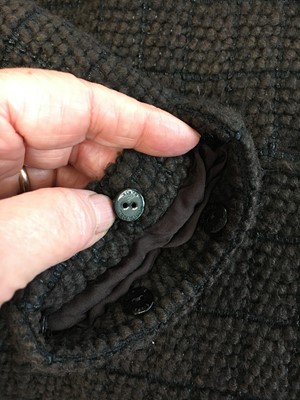 Lot 46 - A Chanel by Karl Lagerfeld brown and black tweed and fur jacket, circa 2010