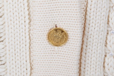 Lot 76 - A Chanel by Karl Lagerfeld cream cable-knit wool cardigan, 1990s