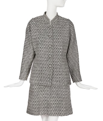 Lot 29 - A Chanel by Karl Lagerfeld black and white tweed suit, circa 2012