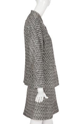 Lot 29 - A Chanel by Karl Lagerfeld black and white tweed suit, circa 2012