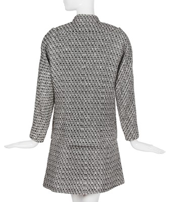 Lot 29 - A Chanel by Karl Lagerfeld black and white tweed suit, circa 2012