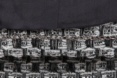 Lot 29 - A Chanel by Karl Lagerfeld black and white tweed suit, circa 2012