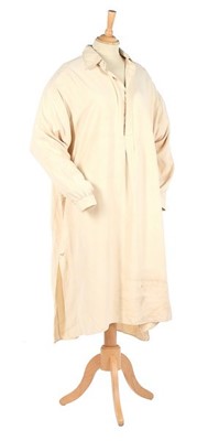 Lot 376 - Winston Churchill's cream silk night-shirt,...