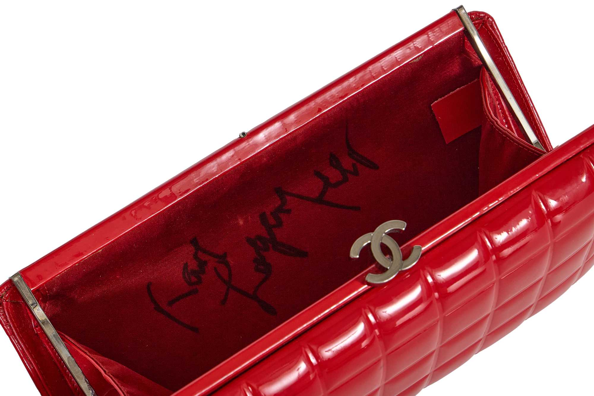 Lot 14 - A hand-signed Chanel by Karl Lagerfeld red patent leather 'chocolate square' clutch, circa 2006
