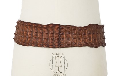 Lot 317 - An Alexander McQueen brown crocodile skin belt, Autumn-Winter 2007-08