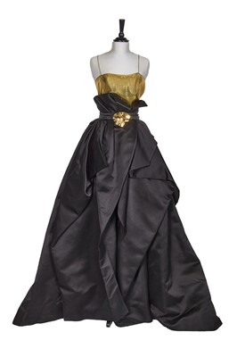 Lot 111 - An Alexandre Vauthier black duchesse satin and gold lamé ensemble, circa 2023