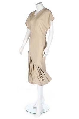 Lot 294 - A John Galliano bias-cut beige viscose dress,...