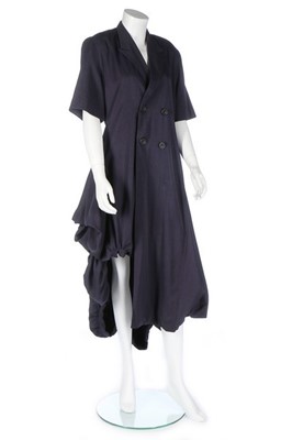 Lot 283 - A John Galliano navy wool gabardine coat-dress,...