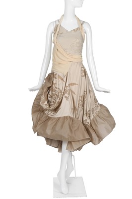 Lot 222 - A Christian Dior by John Galliano ecru silk and chiffon evening gown, commercial collection 2006