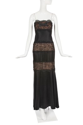 Lot 196 - An Yves Saint Laurent haute couture black lace and satin evening dress, Spring-Summer 1996
