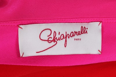 Lot 90 - A Schiaparelli haute couture by Bertrand Guyon shocking pink and scarlet silk evening dress, Spring-Summer 2017