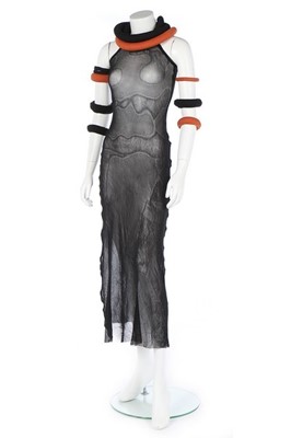 Lot 316 - A Jean Paul Gaultier black stockinette dress...