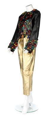 Lot 312 - An Yves Saint Laurent 'gem' adorned leather...