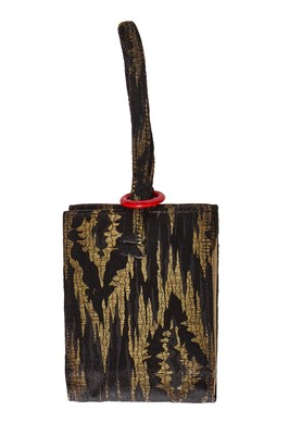Lot 506 - A Cartier black and gold brocaded silk vanity mirror, 1920s