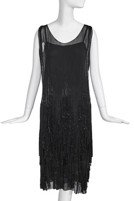 Lot 503 - A Gabrielle Chanel haute couture beaded black georgette 'ribbon' dress, Autumn-Winter 1924-25