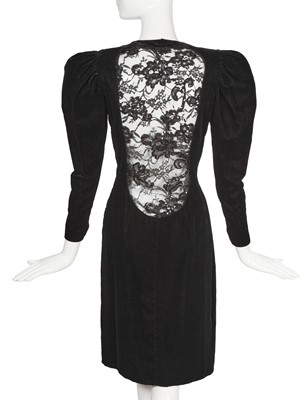 Lot 197 - An Yves Saint Laurent haute couture black velvet cocktail dress with lace back, 1970s