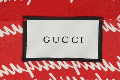 Lot 95 - A Gucci by Alessandro Michele printed red crêpe de chine ensemble, Spring-Summer 2016