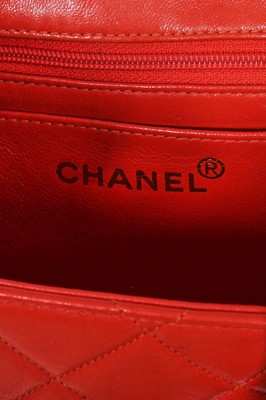 Lot 79 - A Chanel by Karl Lagerfeld quilted orange leather crossbody bag, 1996-1997