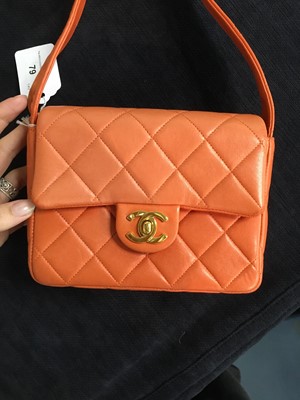 Lot 79 - A Chanel by Karl Lagerfeld quilted orange leather crossbody bag, 1996-1997