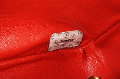 Lot 79 - A Chanel by Karl Lagerfeld quilted orange leather crossbody bag, 1996-1997