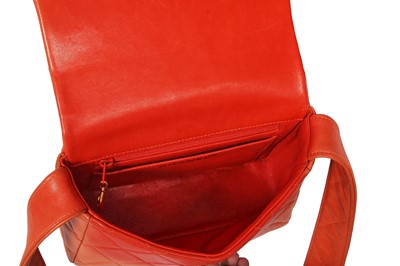Lot 79 - A Chanel by Karl Lagerfeld quilted orange leather crossbody bag, 1996-1997