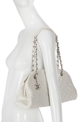 Lot 33 - A Chanel by Karl Lagerfeld white quilted patent leather shoulder bag, 2011