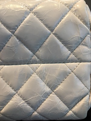 Lot 33 - A Chanel by Karl Lagerfeld white quilted patent leather shoulder bag, 2011