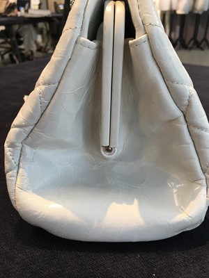 Lot 33 - A Chanel by Karl Lagerfeld white quilted patent leather shoulder bag, 2011