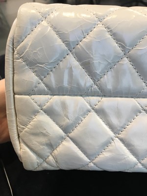 Lot 33 - A Chanel by Karl Lagerfeld white quilted patent leather shoulder bag, 2011