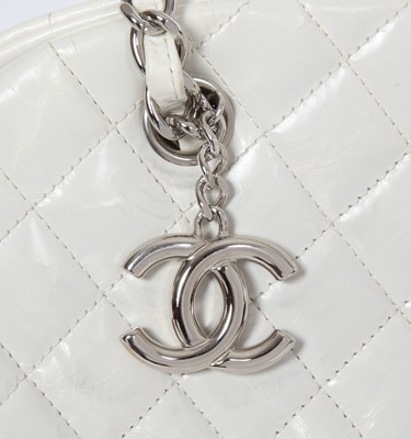 Lot 33 - A Chanel by Karl Lagerfeld white quilted patent leather shoulder bag, 2011