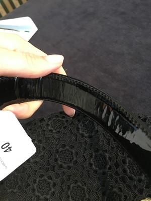 Lot 40 - A Chanel by Karl Lagerfeld 'Coco Twin' black patent leather and lace evening bag, 'Farm' collection, Spring-Summer 2010