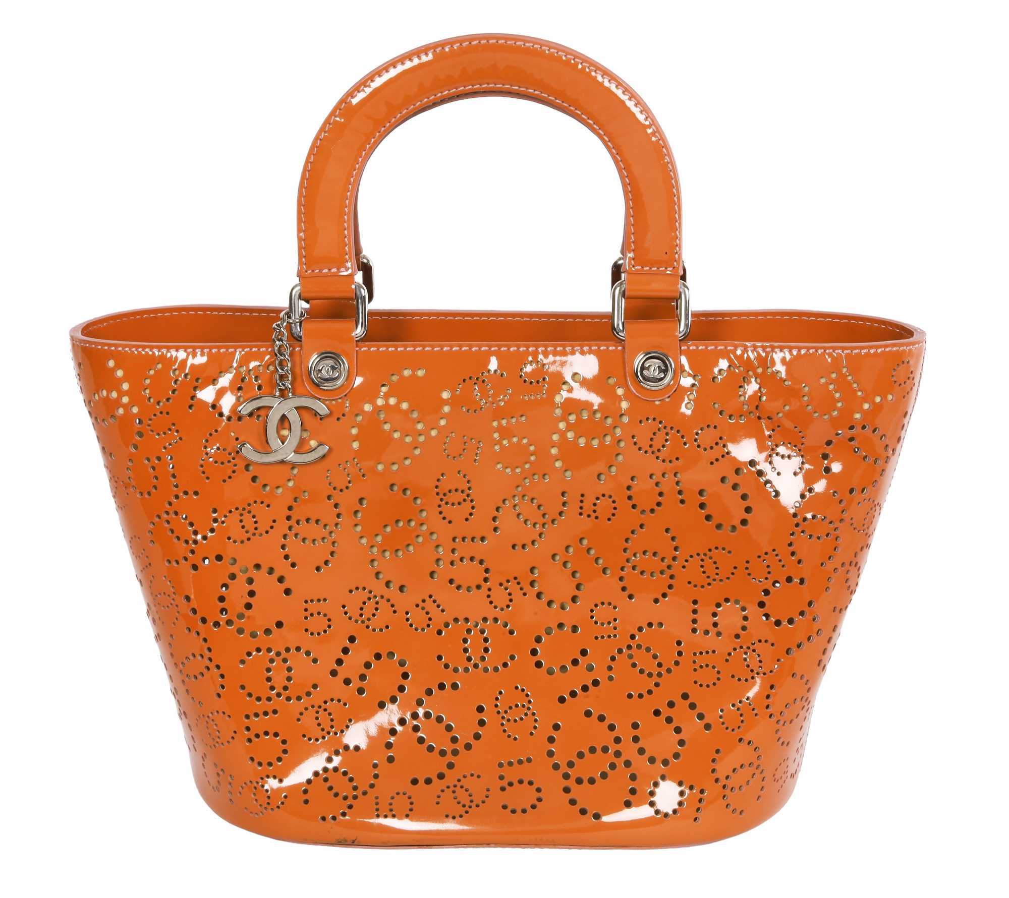 Lot 65 - A Chanel by Karl Lagerfeld punched orange patent leather tote, 2005-2006