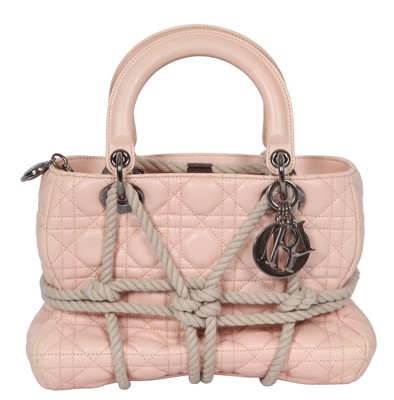 Lot 202 - A Christian Dior Lady Dior Art by Morgane Tschiember pink leather and rope 'bondage' handbag, 2020
