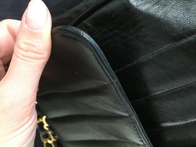 Lot 83 - A Chanel by Karl Lagerfeld jumbo black leather flap bag, 1991-94