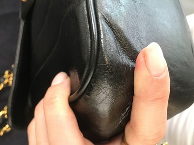 Lot 83 - A Chanel by Karl Lagerfeld jumbo black leather flap bag, 1991-94