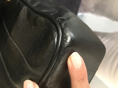 Lot 83 - A Chanel by Karl Lagerfeld jumbo black leather flap bag, 1991-94