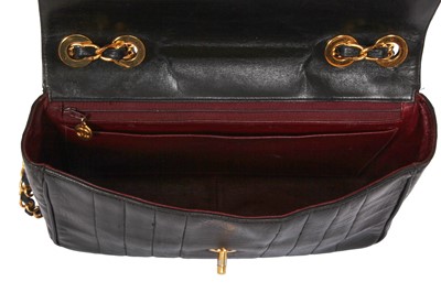 Lot 83 - A Chanel by Karl Lagerfeld jumbo black leather flap bag, 1991-94