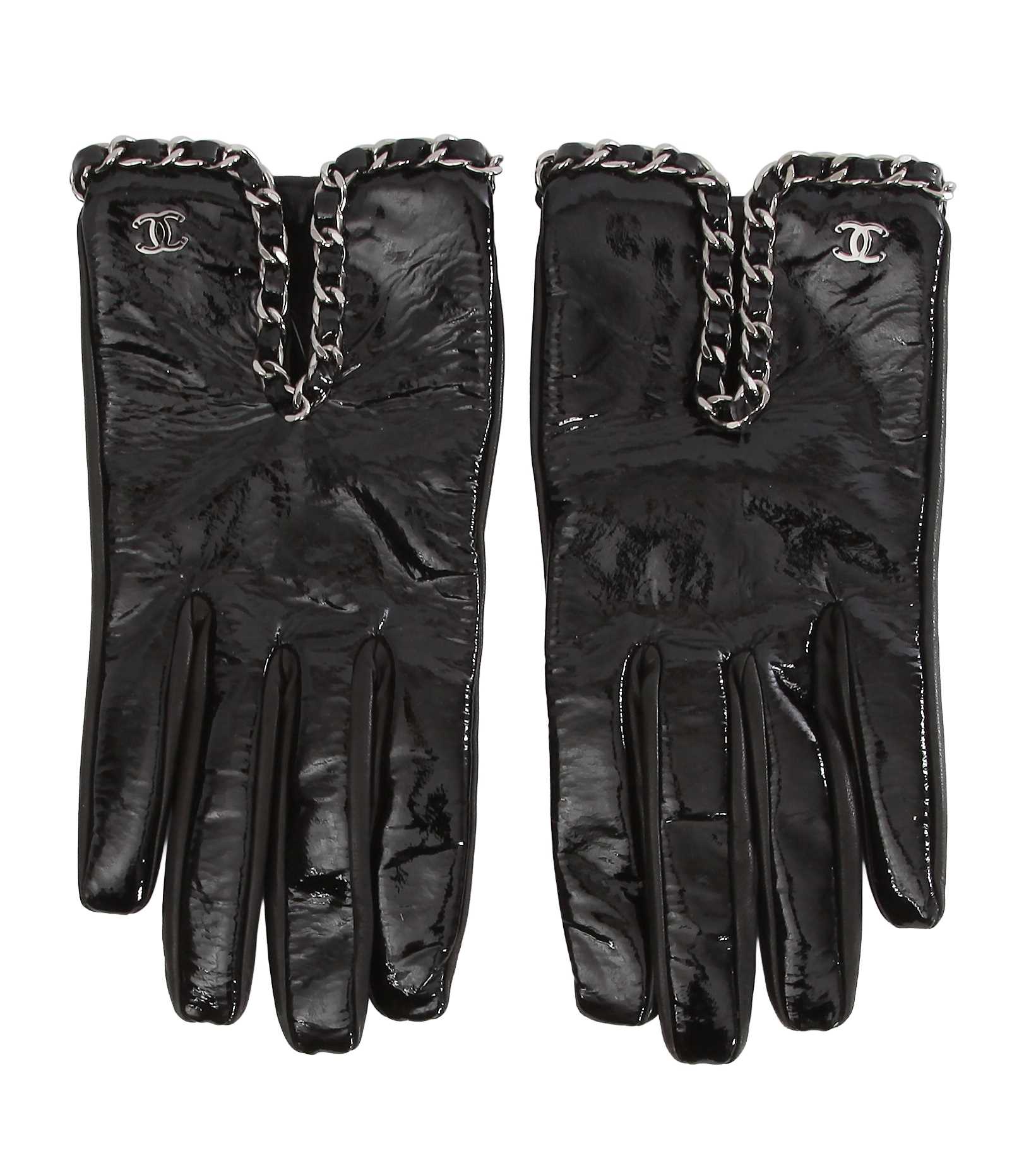 Lot 44 - A pair of Chanel by Karl Lagerfeld black patent leather gloves, 2010s