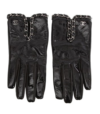 Lot 44 - A pair of Chanel by Karl Lagerfeld black patent leather gloves, 2010s