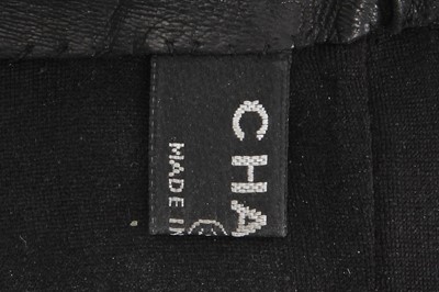 Lot 44 - A pair of Chanel by Karl Lagerfeld black patent leather gloves, 2010s