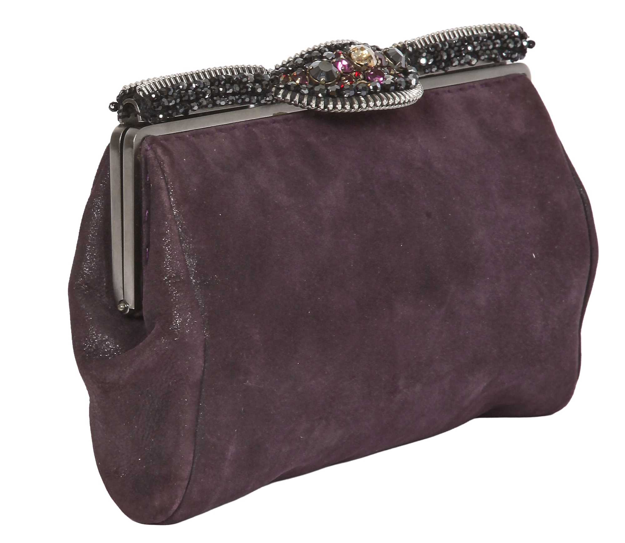 Lot 62 - A Chanel by Karl Lagerfeld purple suede evening clutch, early 2000s